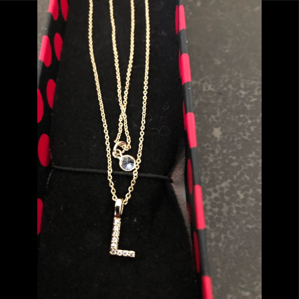 2 Gold colored chains  both with diamond chips L